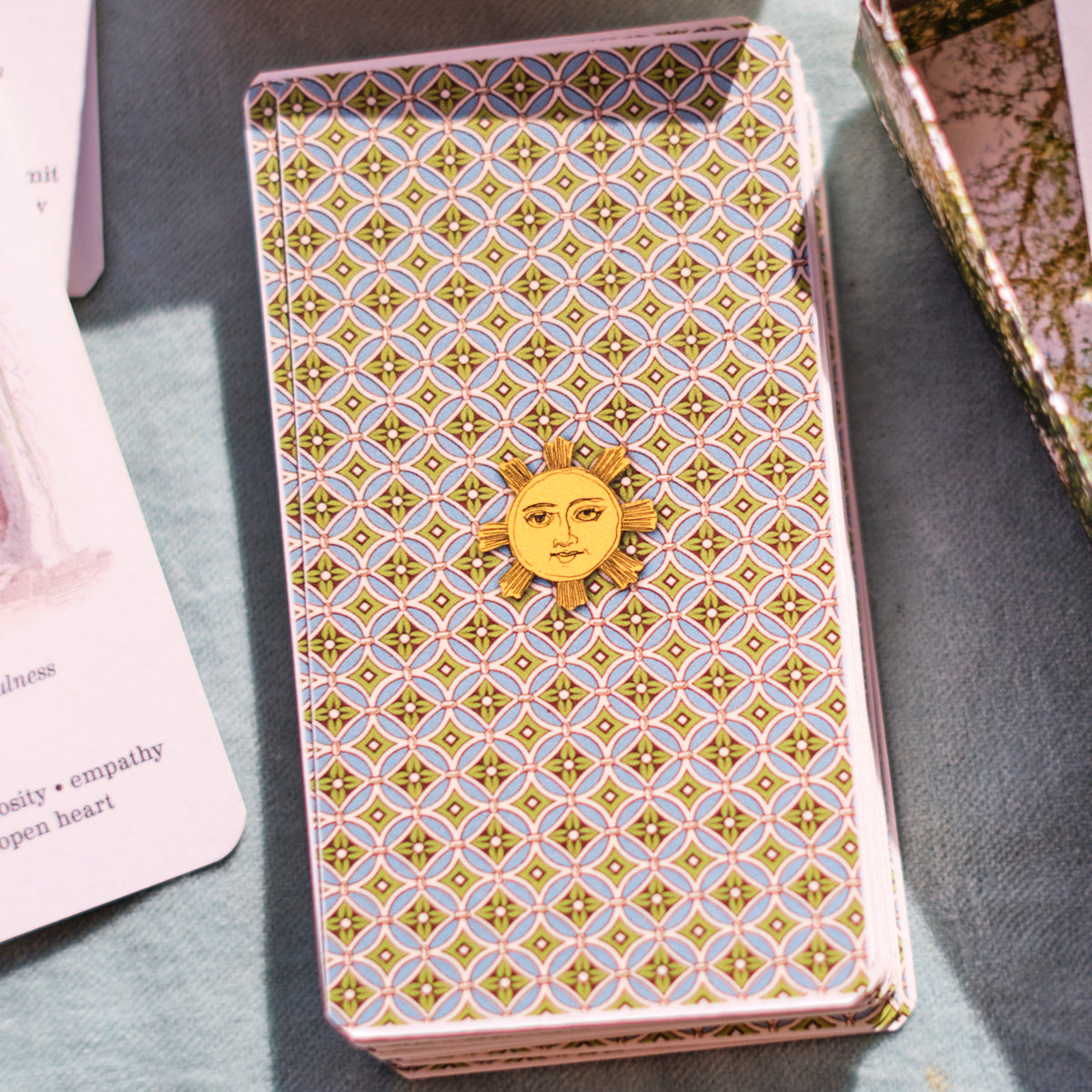 card back of Flower Oracle with Sunman logo